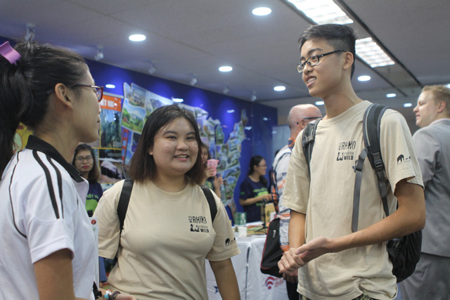Two ‘rhino youth ambassadors’ (right) share their stories at the event.