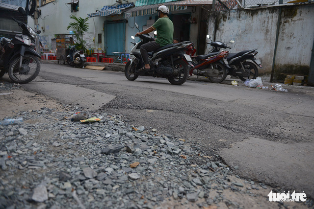 Rocks fill a part of a street following recent road works.