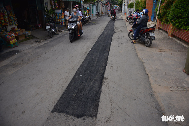 Commuters face difficulty when traveling on this section of Thach Thi Thanh Street in District 1.