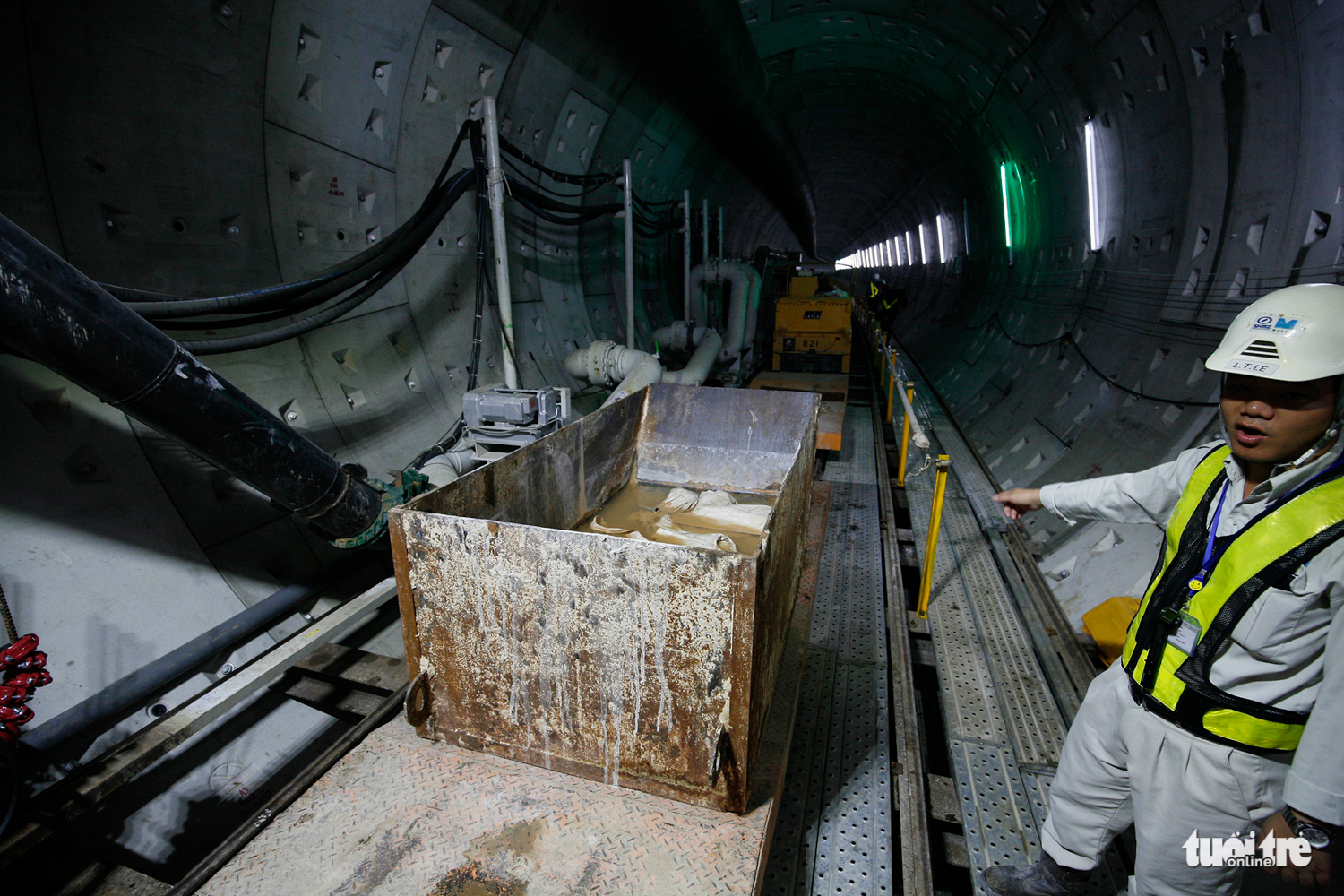 Material is transported into the tunnel.