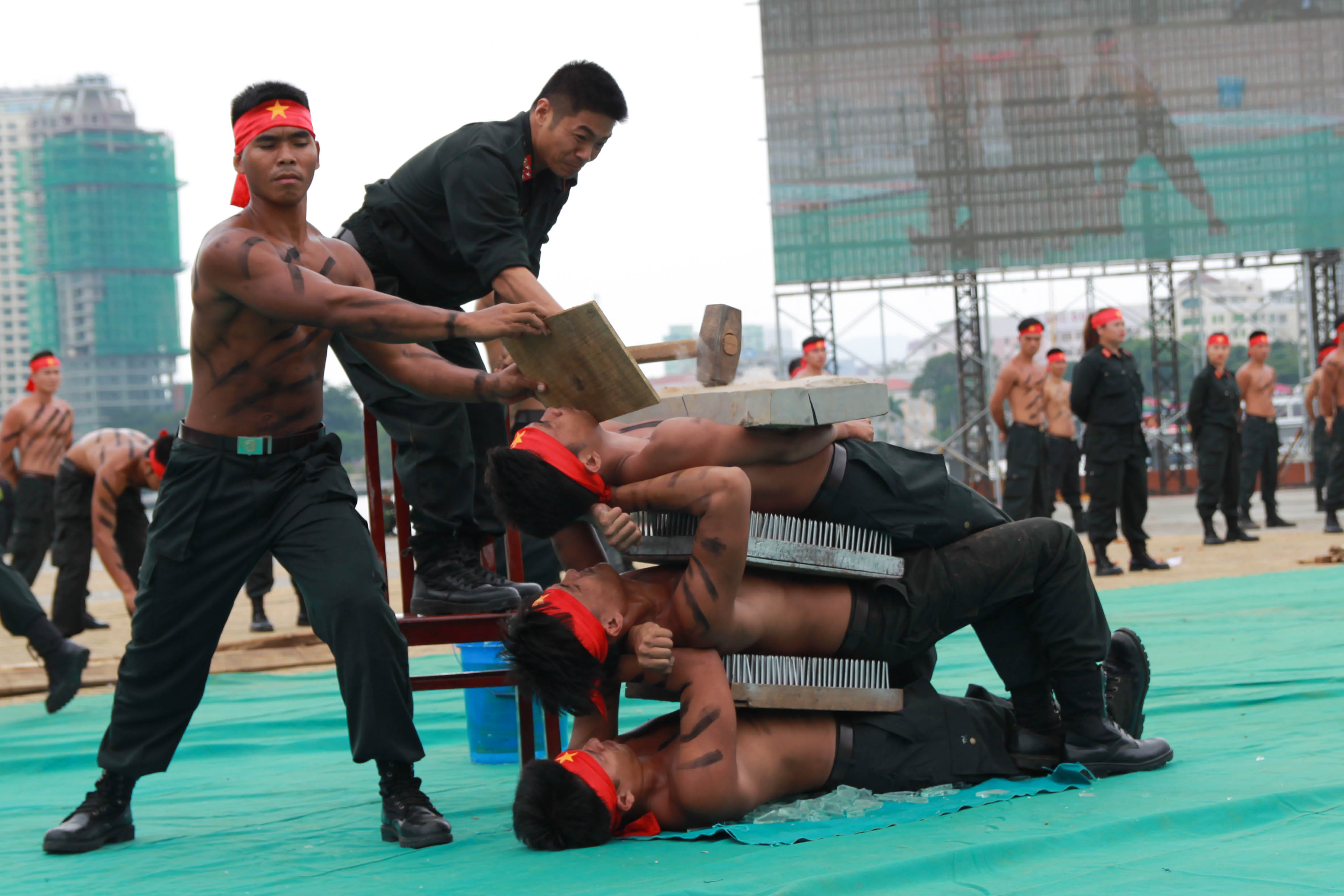 Officers take part in martial art performances during the ceremony.