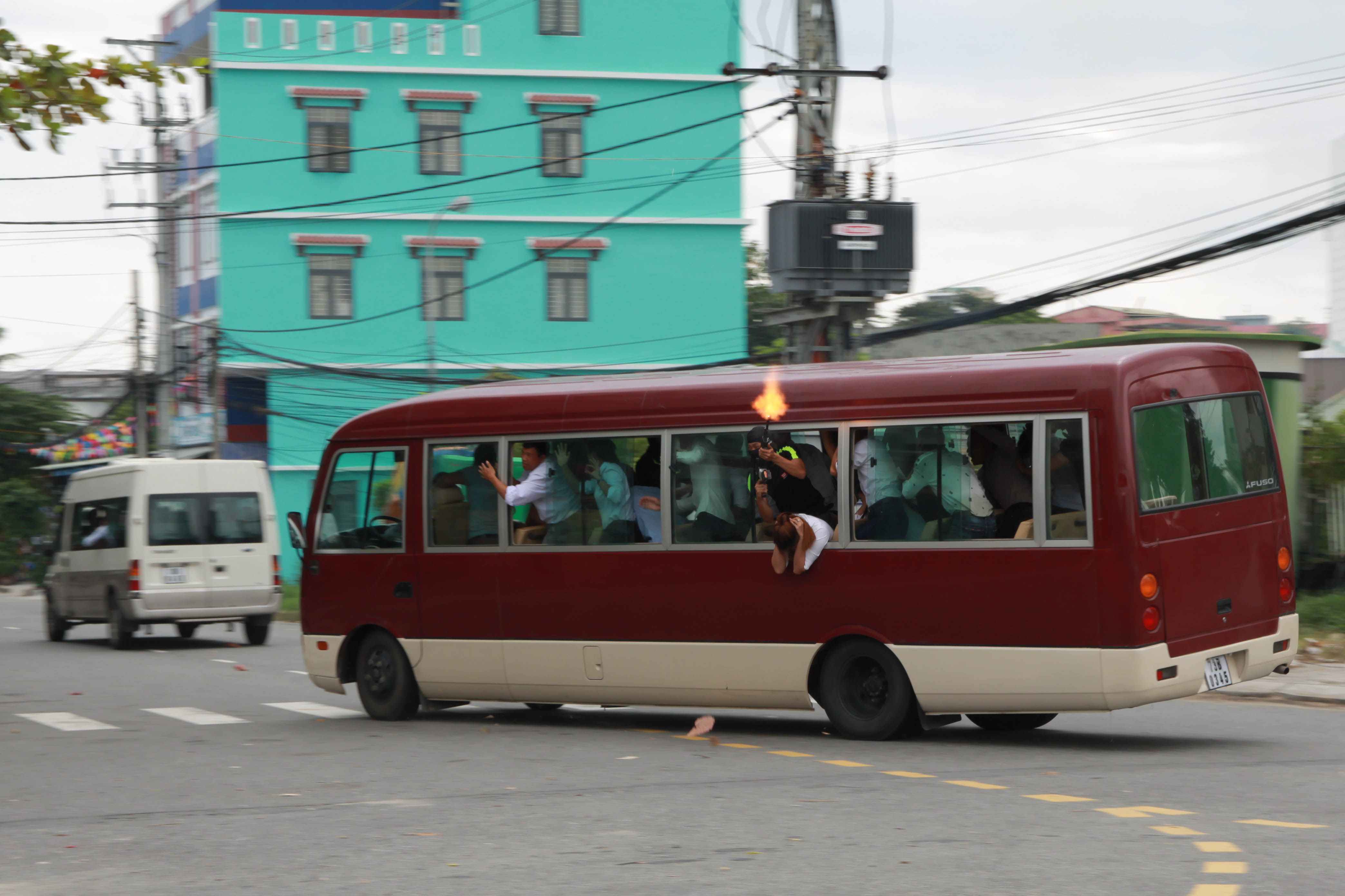 A group of terrorists hijack a bus in an anti-terror drill scenario.