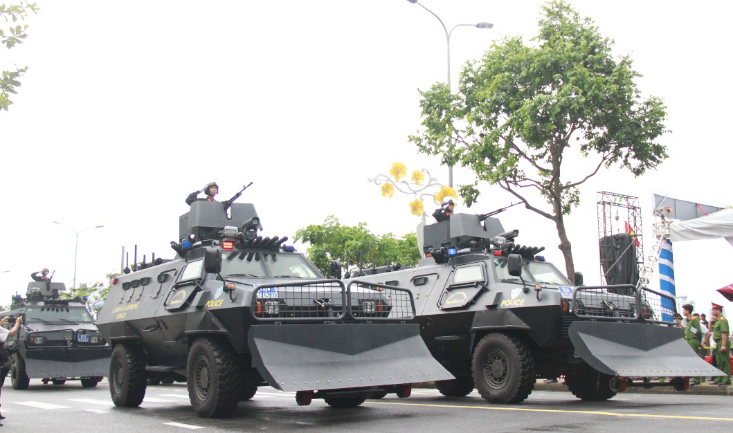 Police and military units participate in the parade.