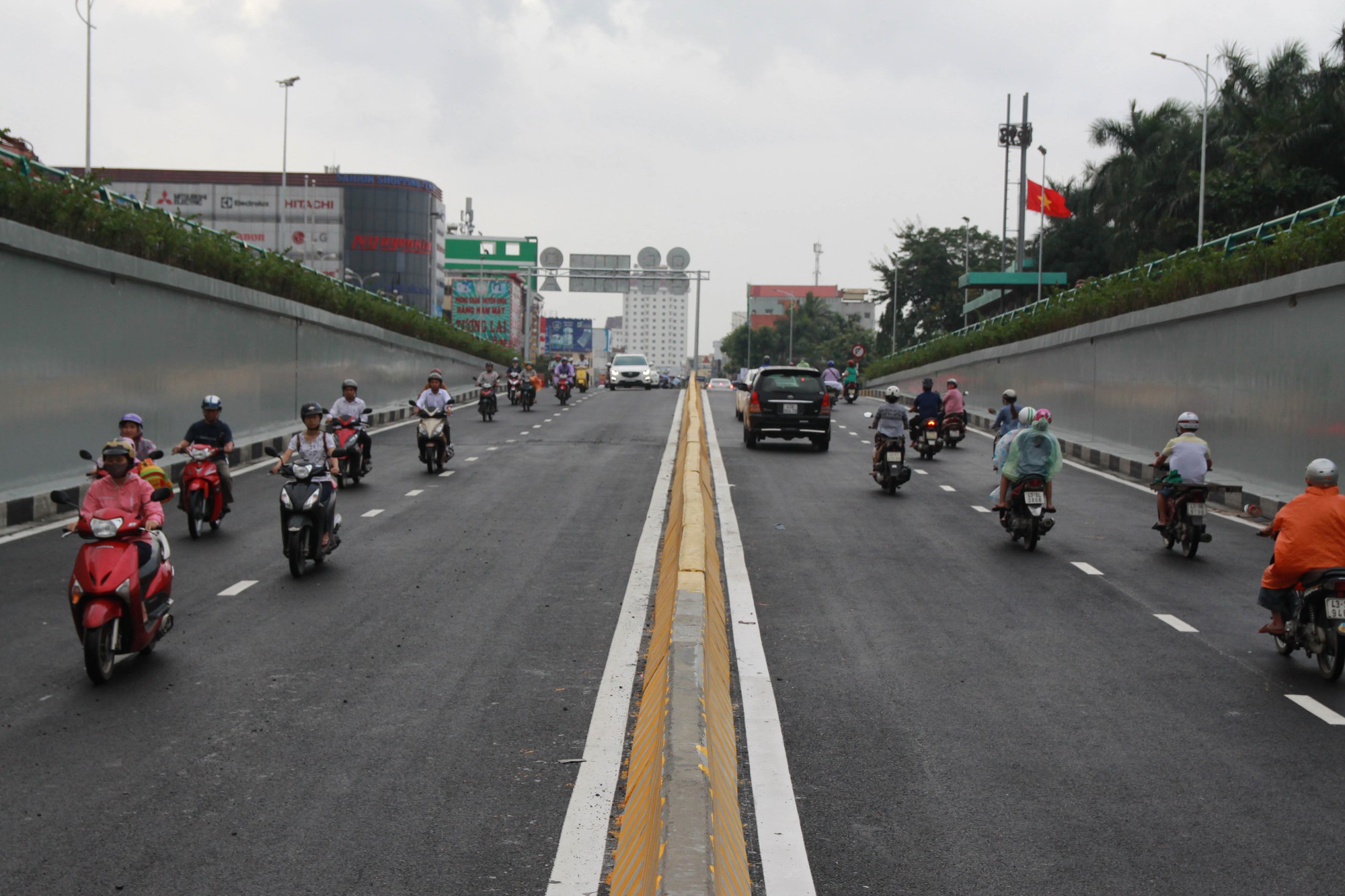 Commuters travel on the newly-constructed underpass. Photo: Tuoi Tre