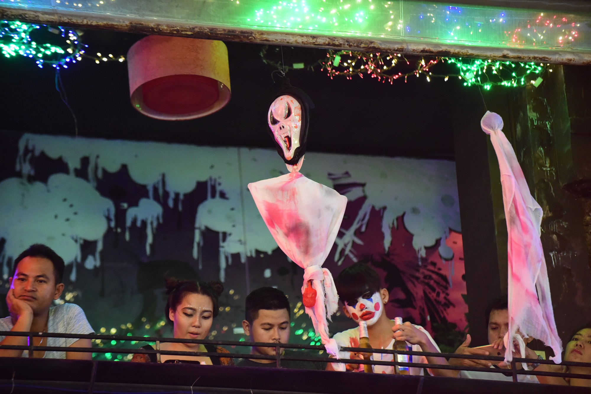 A pub on Bui Vien Street displays Halloween-themed decorations.