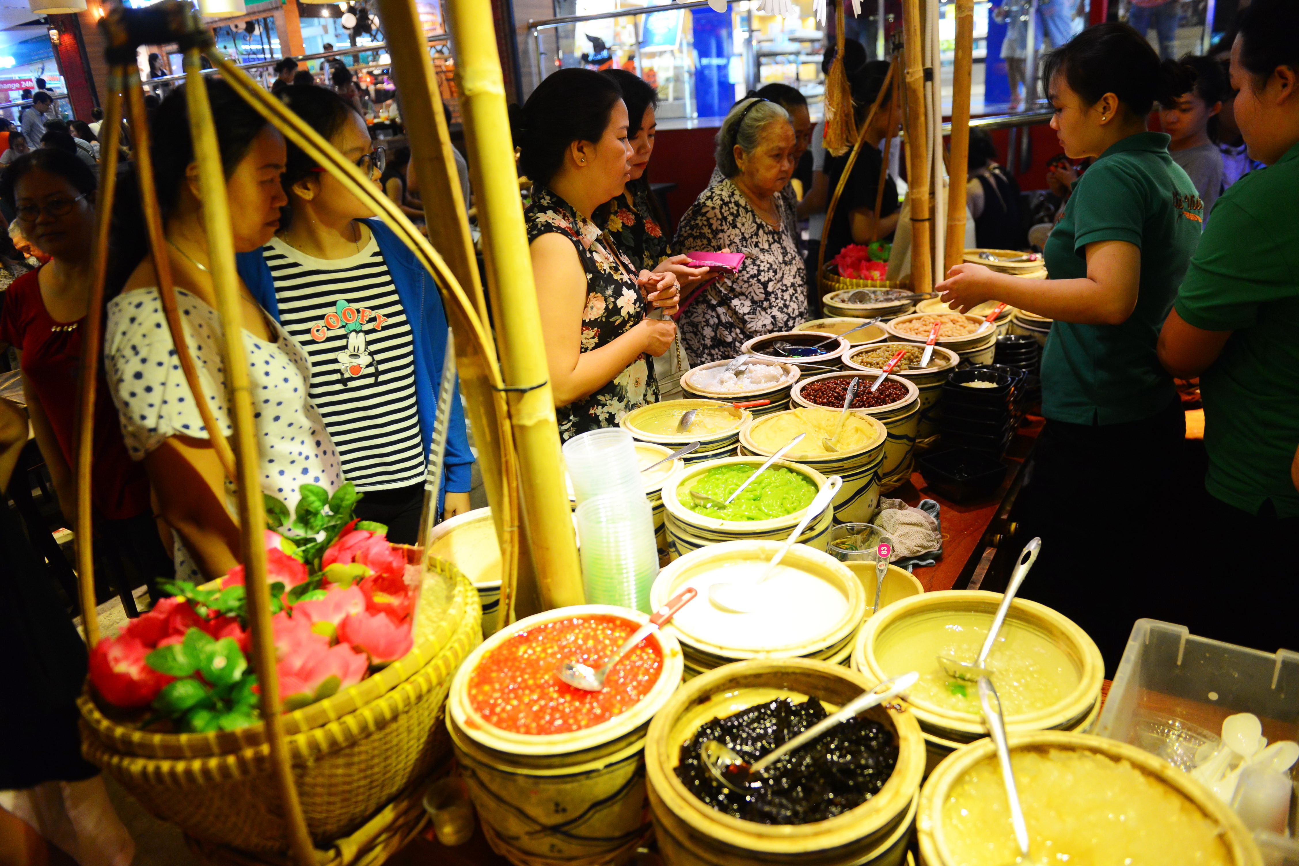 Traditional Vietnamese desert is offered at a food stall.