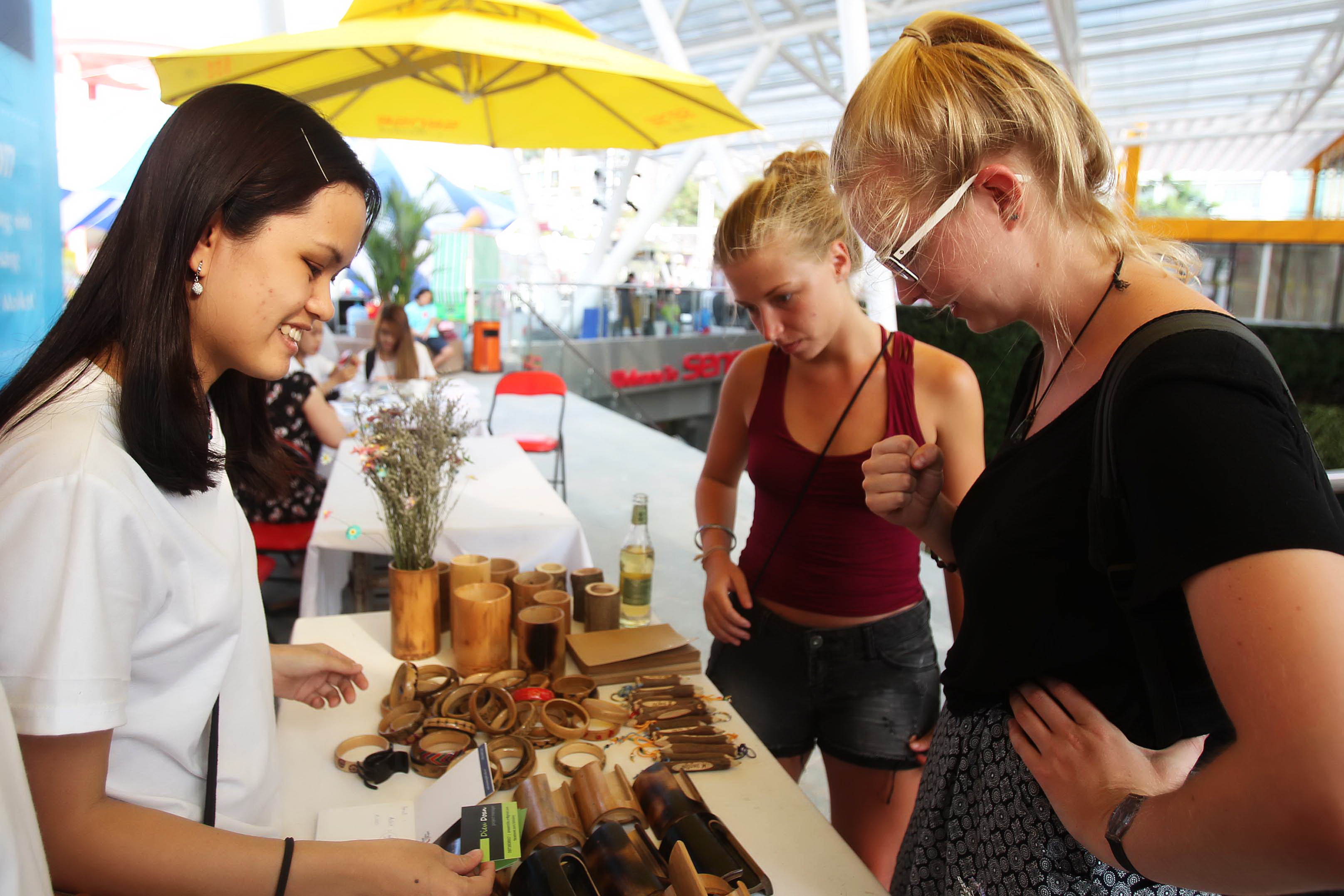 Visitors check out handicrafts sold at the underground trade area.