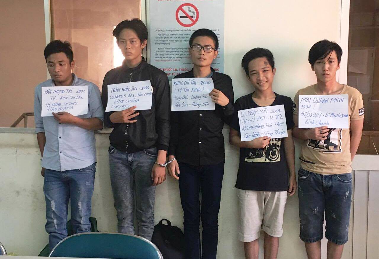 Members of the arms-trafficking ring run by Nguyen Hong Phuc. Photo: Ho Chi Minh City Police