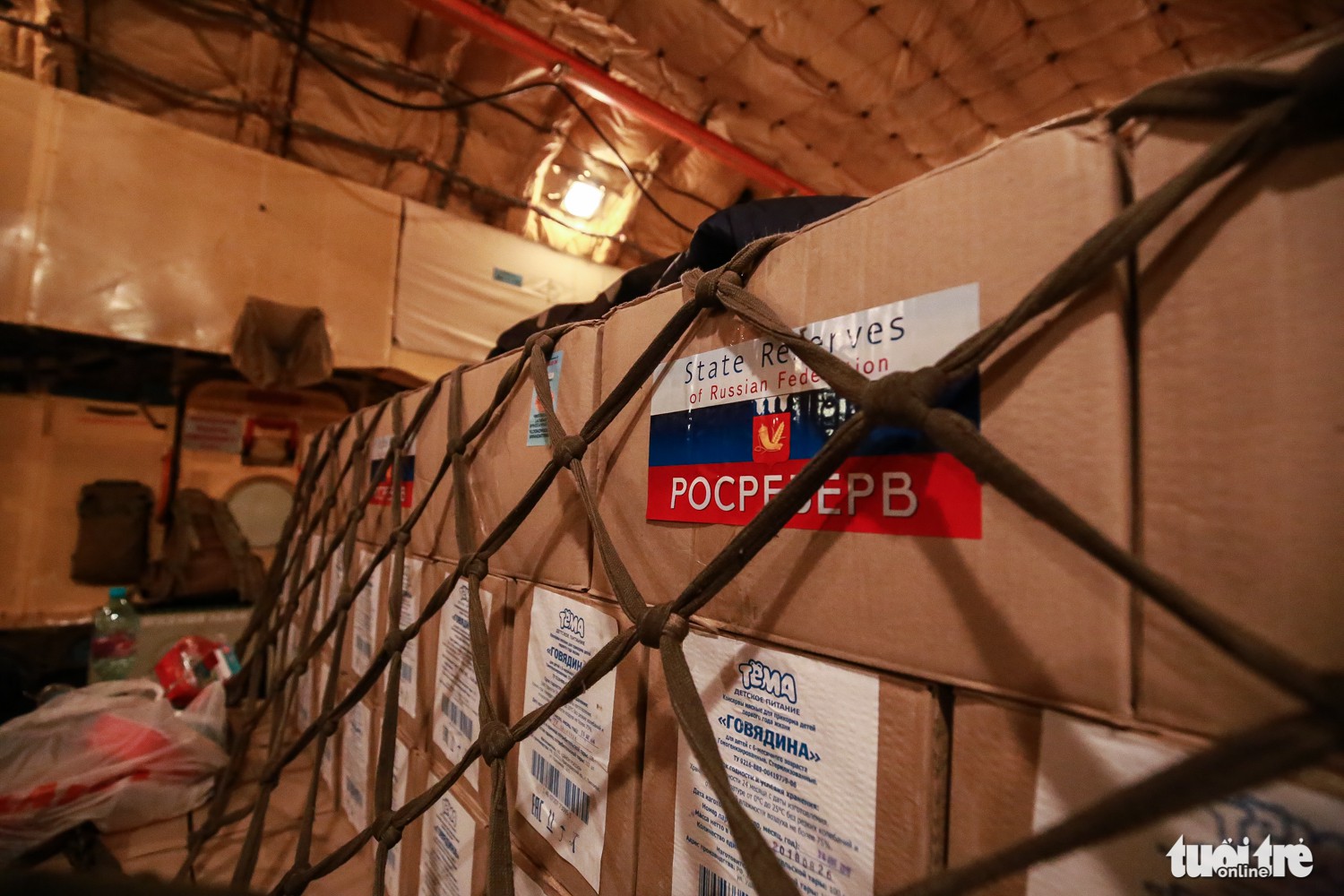 Cartons of goods are stored inside the aircraft. Photo: Tuoi Tre