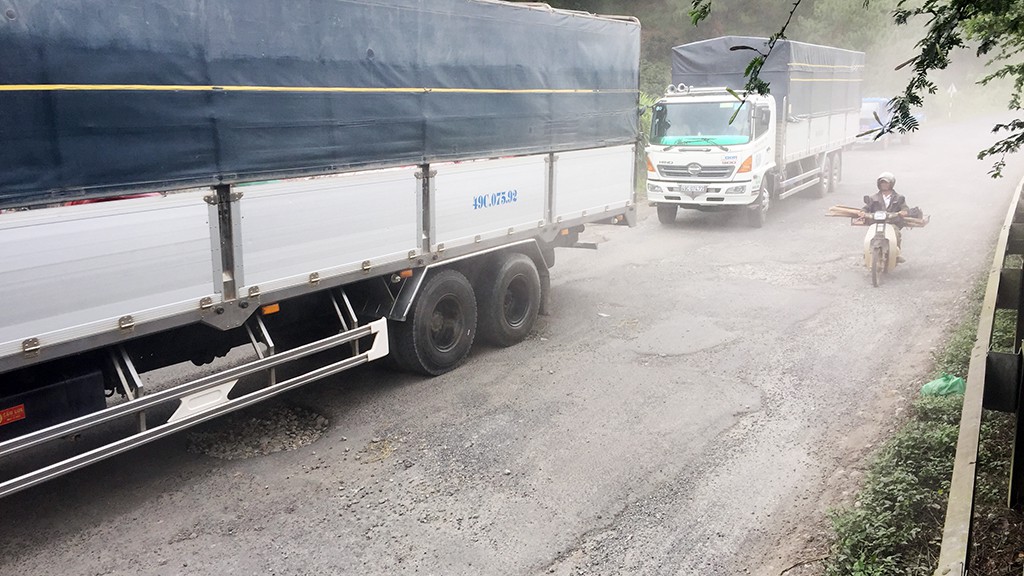 The path is blanketed with dust when large trucks use it.