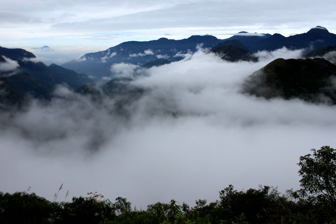 The clouds slowly cover O Quy Ho Mountain peak. Photo: Thu Hue