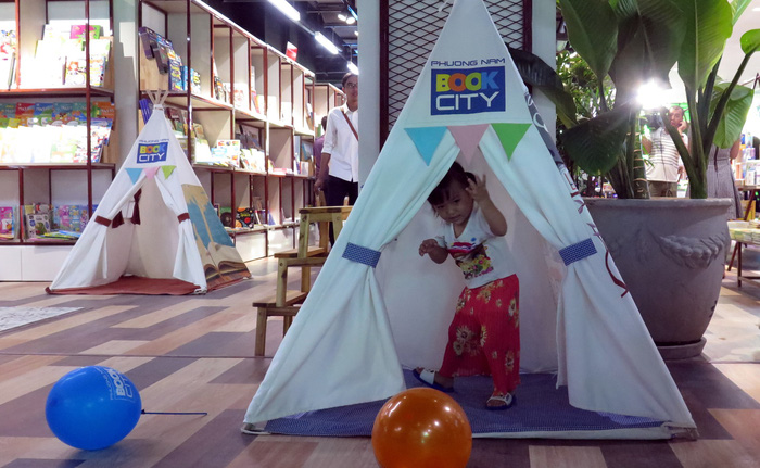 Tents are set up as a playground for children. Photo: Tuoi Tre