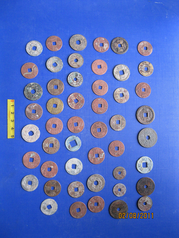 Ancient Vietnamese coins unearthed from the Vuon Chuoi archeological site in Hanoi. Courtesy of Dr. Nguyen Van Huy