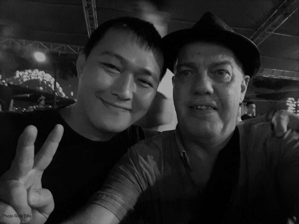With buddy Hoang under Cầu Rồng (Dragon Bridge) in Da Nang