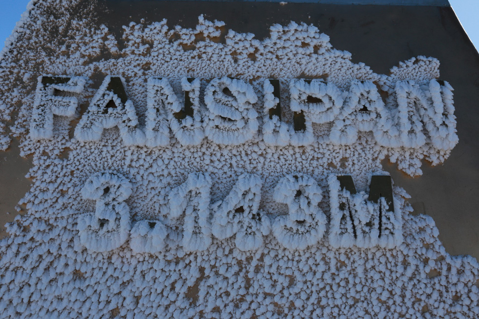 Letters spelling the name and height of the Fansipan summit is covered in snow, December 19, 2017. Photo: Tuoi Tre
