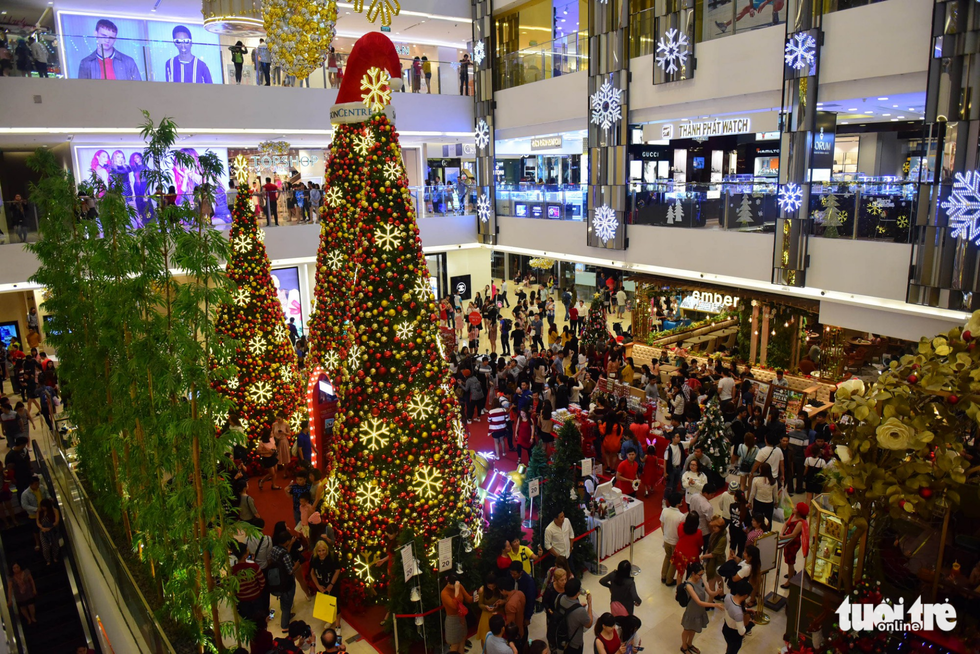 Giant Christmas trees are seen at a shopping mall in District 1, Ho Chi Minh City. Photo: Tuoi Tre