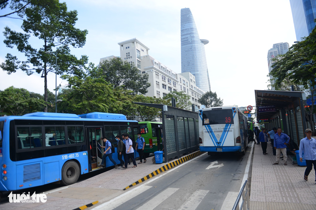 Buses arrive at the bus stop on the morning of December 28, 2017.