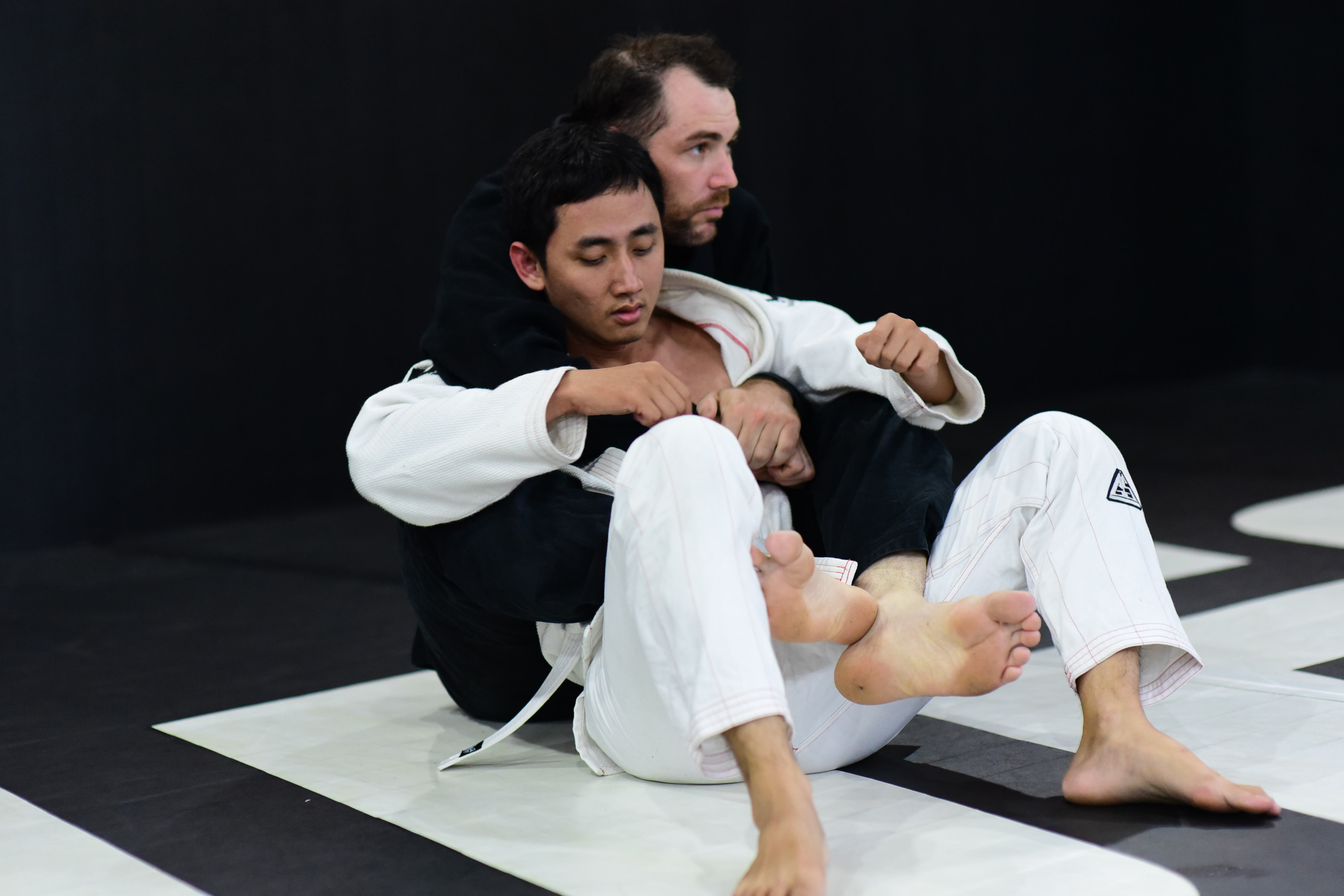 Pierre Desdevises trains with his student at an MMA center in Ho Chi Minh City. Photo: Tuoi Tre