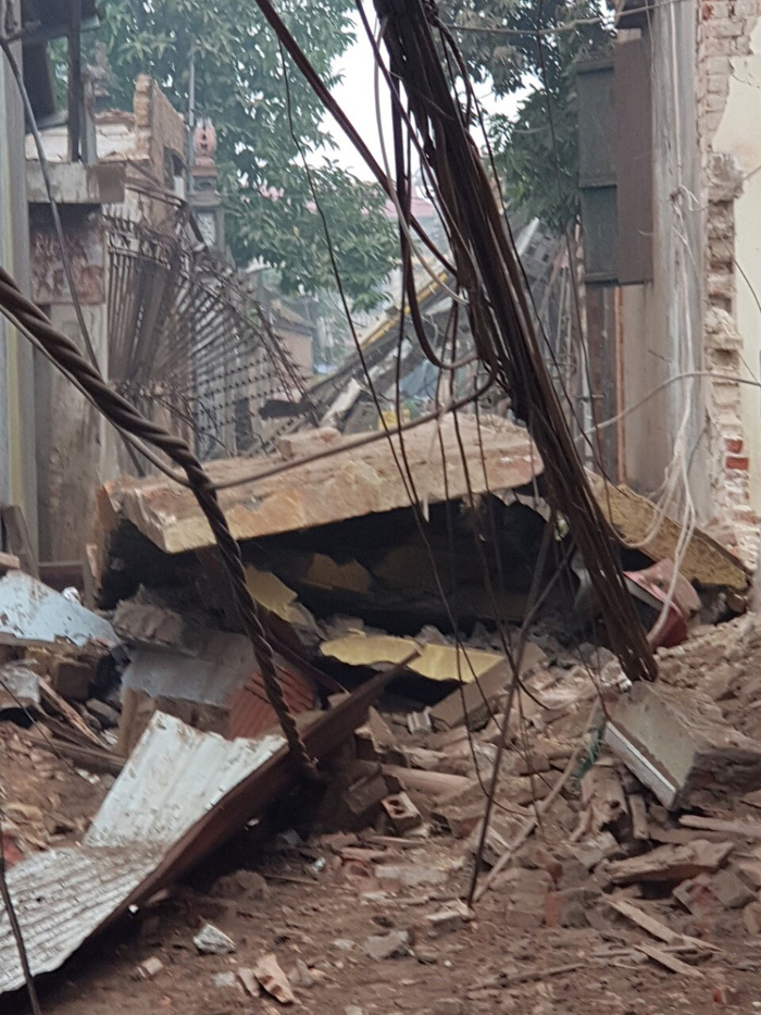 Houses are reduced to rubble at the site of the explosion. Photo: Tuoi Tre