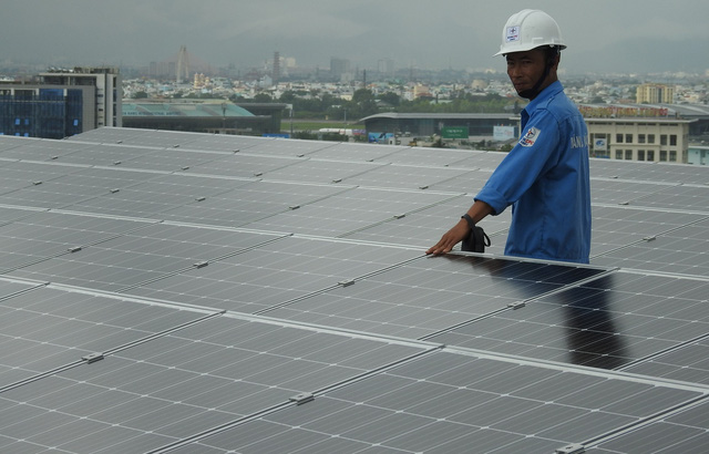 Solar panels are installed on top of a building in Vietnam. Photo: Tuoi Tre