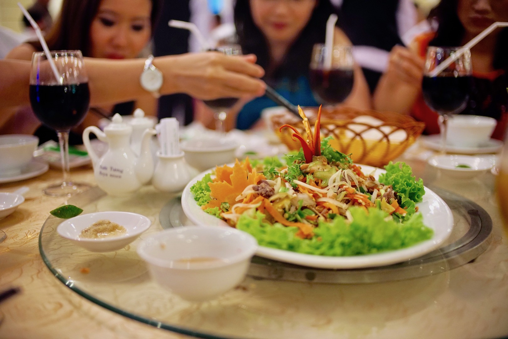 Wedding party members enjoy the appetizer at a wedding party in Ho Chi Minh City on April 20, 2014. Photo: Tien Bui