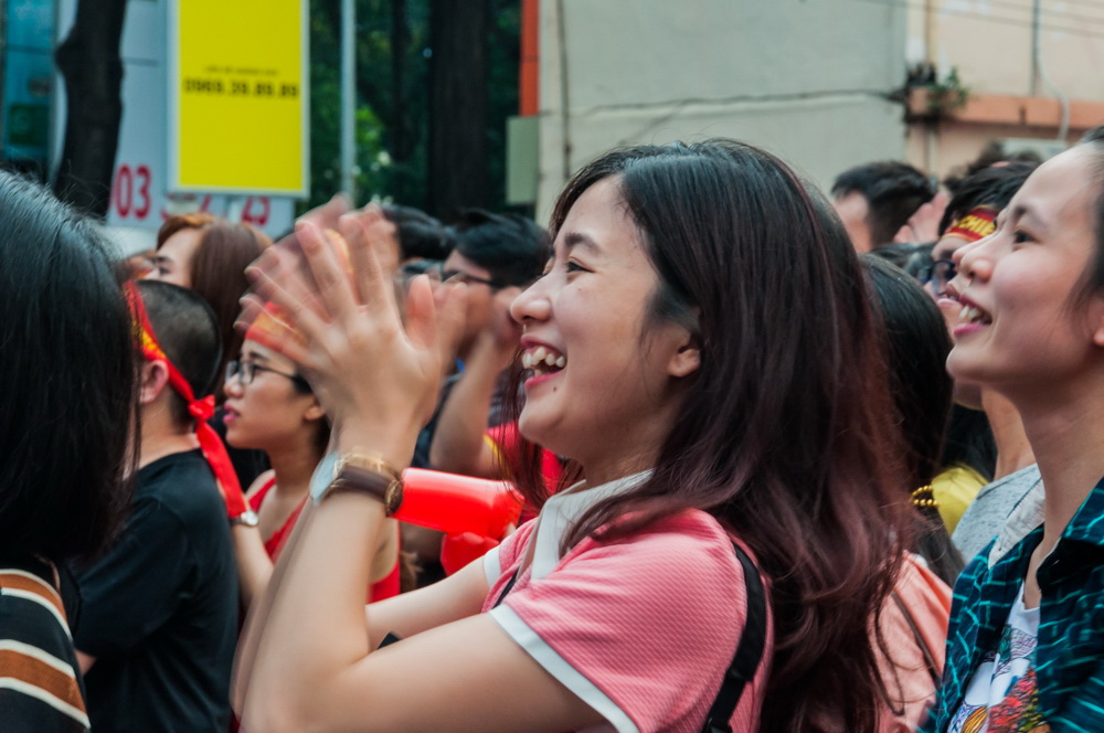 One fan can’t hide her excitement at the Ho Chi Minh City Youth Cultural House during Vietnam’s U23 AFC Championship semi-final against Qatar on January 23, 2018. Photo: Vu Ha Kim Vy