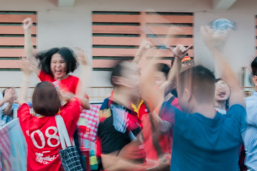 Fans rejoice after the final penalty at the Ho Chi Minh City Youth Cultural House during Vietnam’s U23 AFC Championship semi-final against Qatar on January 23, 2018. Photo: Vu Ha Kim Vy
