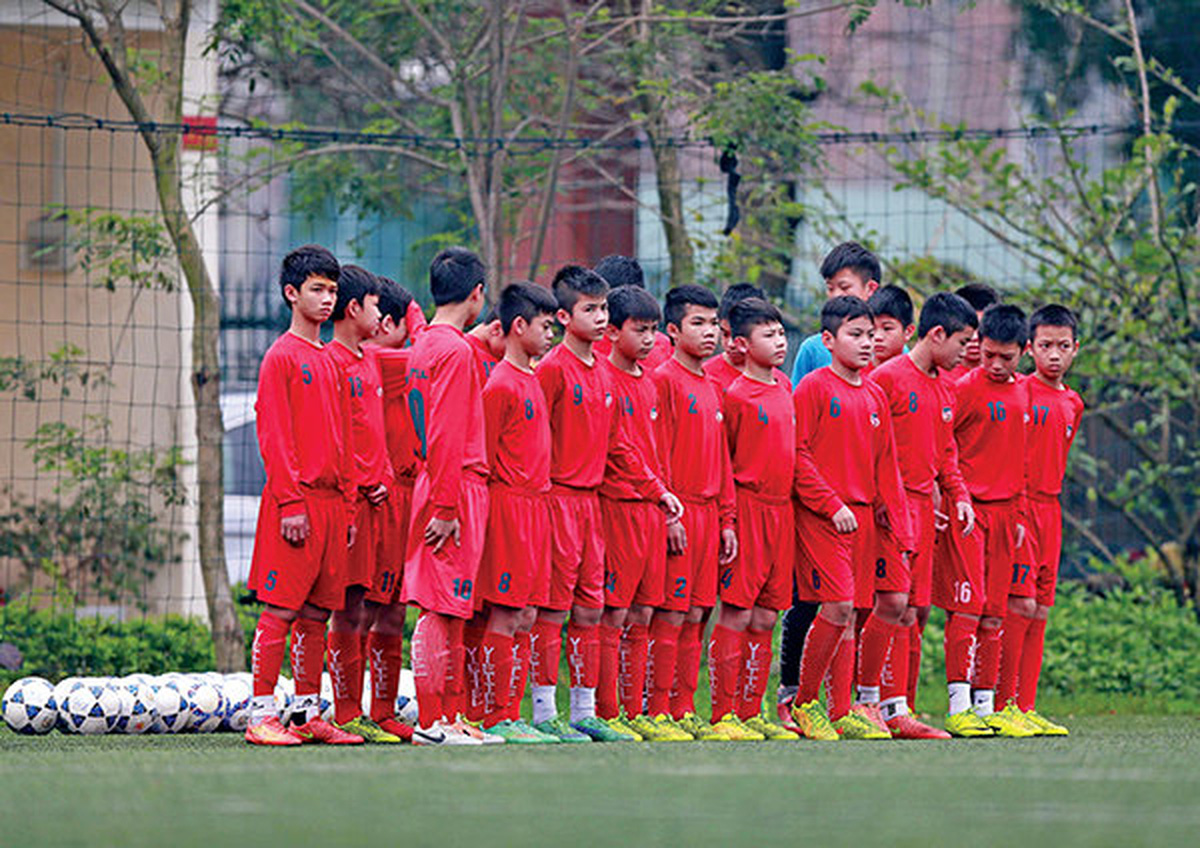 Students are seen at the Viettel football academy in Hanoi. Photo: Tuoi Tre