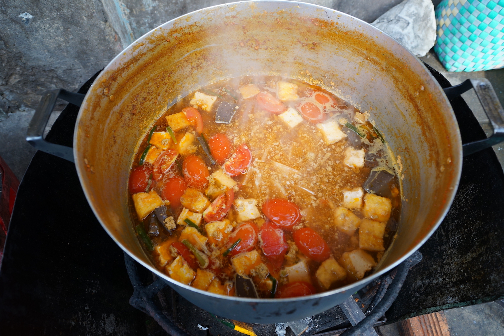 A huge container of bun rieu broth made by Auntie Sang. Photo: Tien Bui