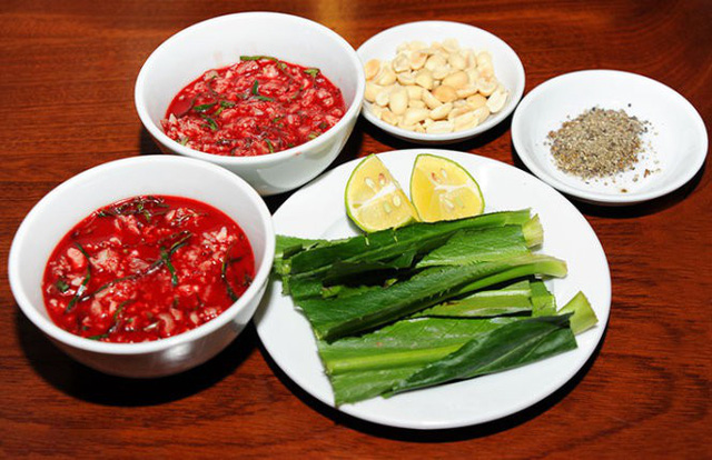 Two dishes of raw blood soup are seen in this photo illustration. Photo: Tuoi Tre