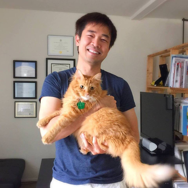 Dr. Tran poses for a photo with his pet. Photo courtesy of Dr. Huynh Tran