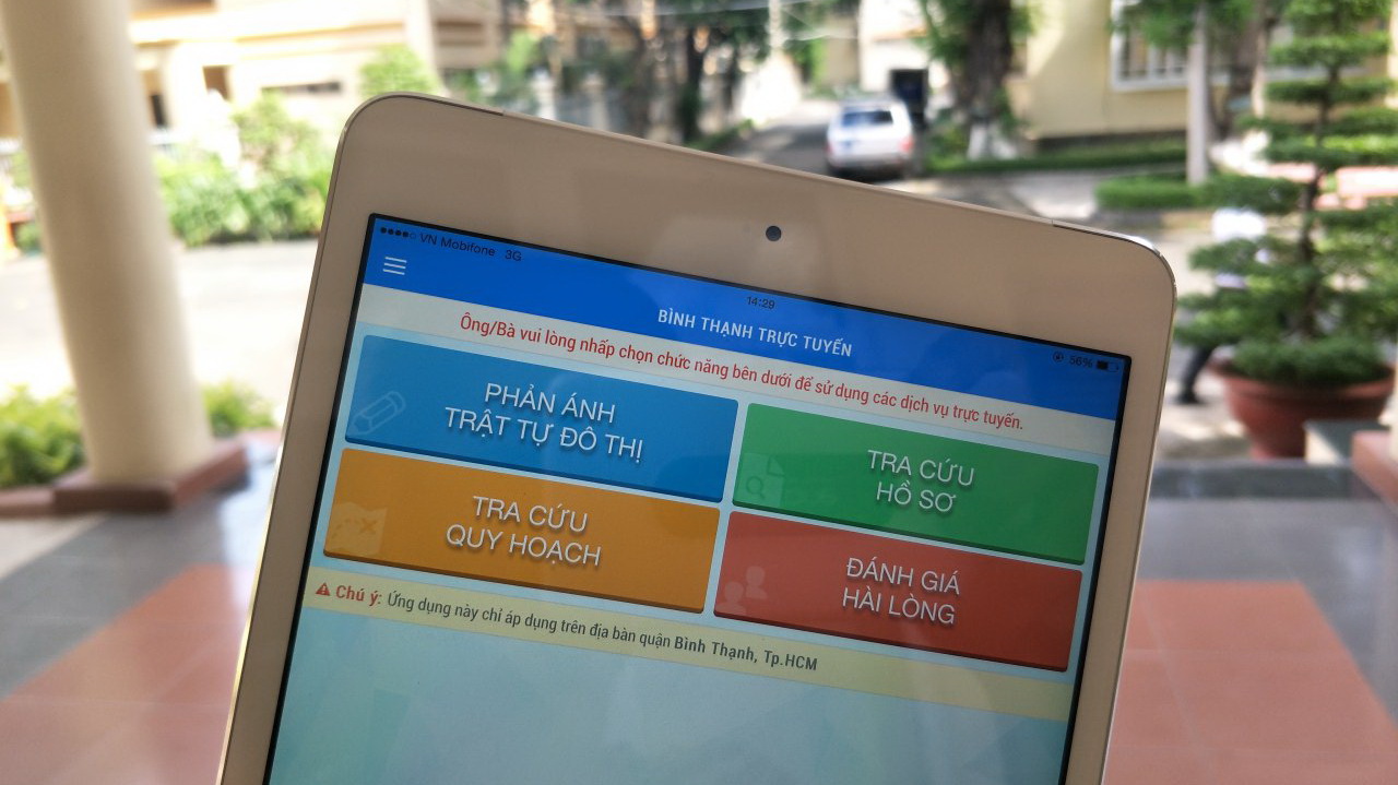 The Binh Thanh public service app is seen on a tablet screen in this photo taken in Ho Chi Minh City. Photo: Tuoi Tre