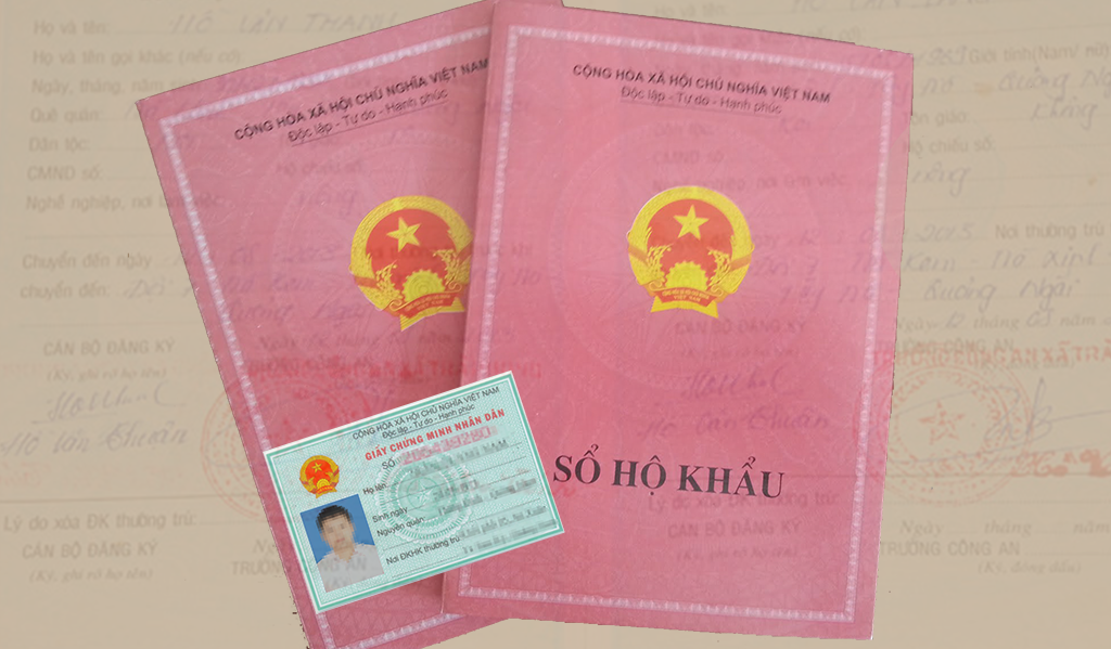 Two Vietnamese residence books and a national ID card are seen in this file Tuoi Tre photo.