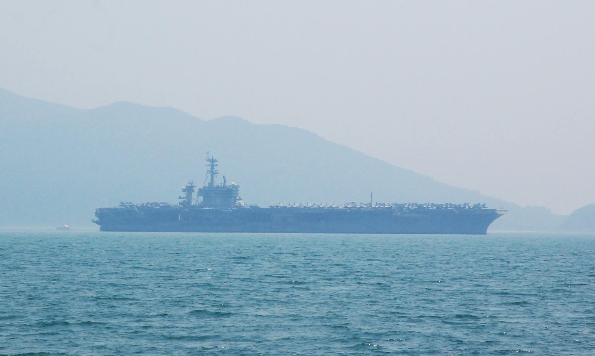 The USS Carl Vinson is seen in foggy weather off Da Nang City, central Vietnam, on March 5, 2018. Photo: Tuoi Tre