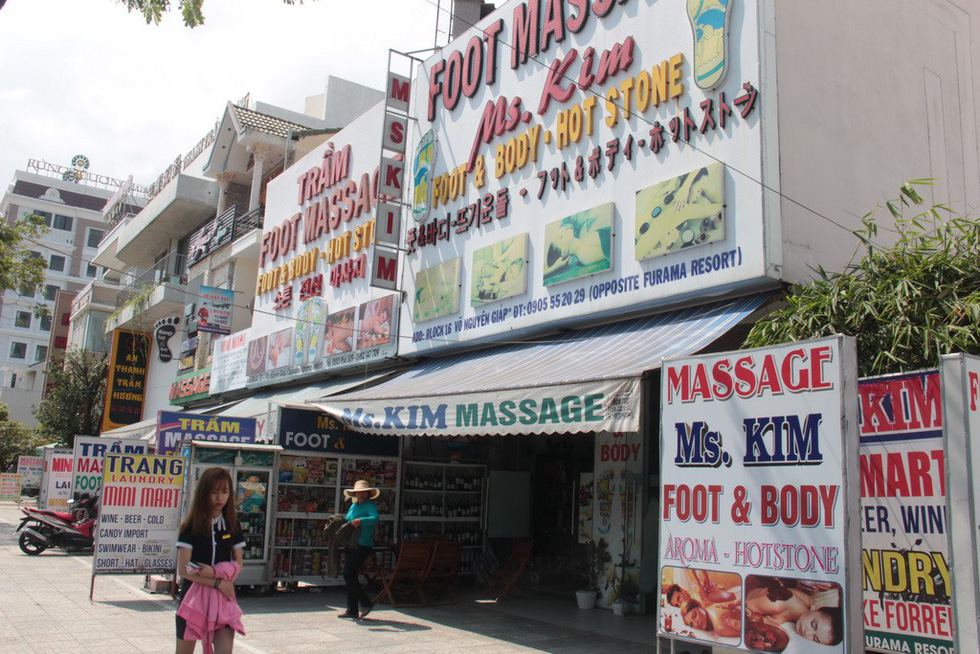 A massage parlor in Da Nang advertises their services in English, Korean, and Japanese. Photo: Tuoi Tre