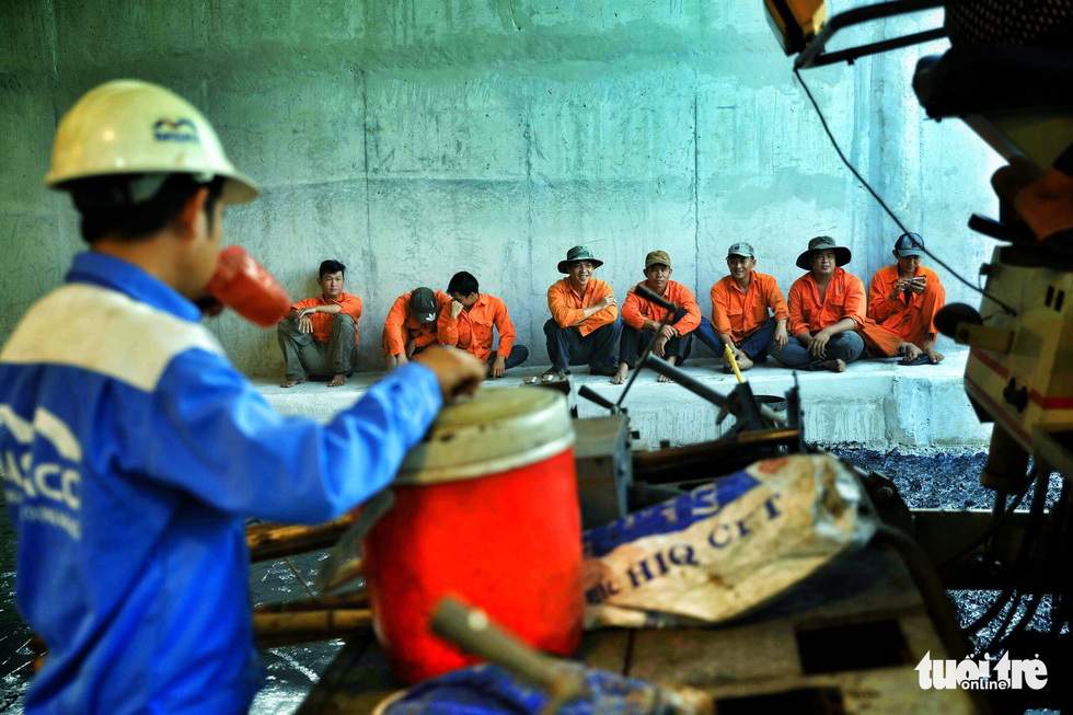 Workers take a break inside the first branch of the An Suong underpass in Ho Chi Minh City. Photo: Tuoi Tre