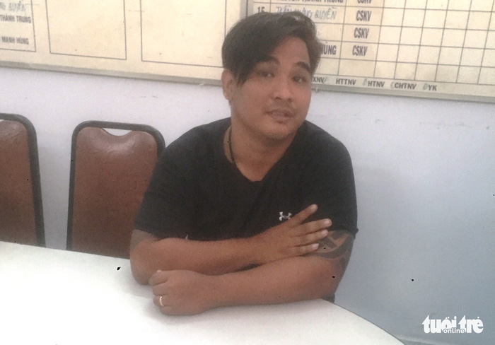 To Quoc Toan in custody at a police station in Ho Chi Minh City, Vietnam. Photo: Tuoi Tre