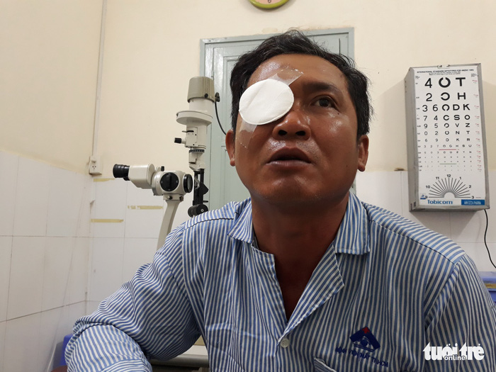 Nguyen Huu Nghia receives treatment at a hospital in Ho Chi Minh City. Photo: Tuoi Tre