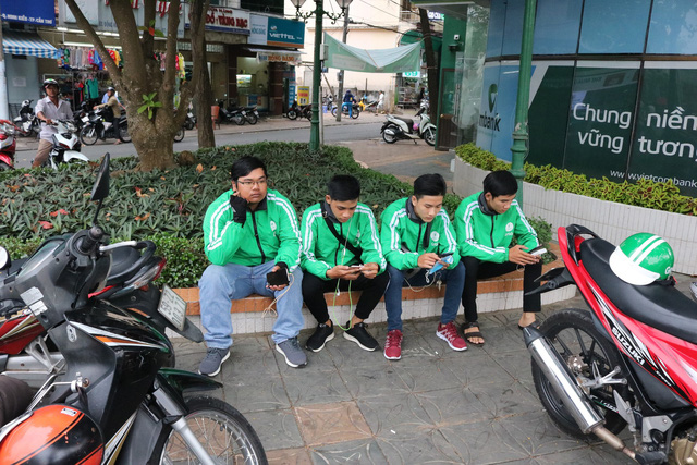 GrabBike drivers in the Mekong Delta province of Can Tho. Photo: Tuoi Tre