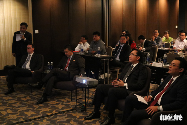 Malaysian officials present activities to take place at The Selangor International Business Summit 2018 to businesspeople and the press. Photo: Tuoi Tre