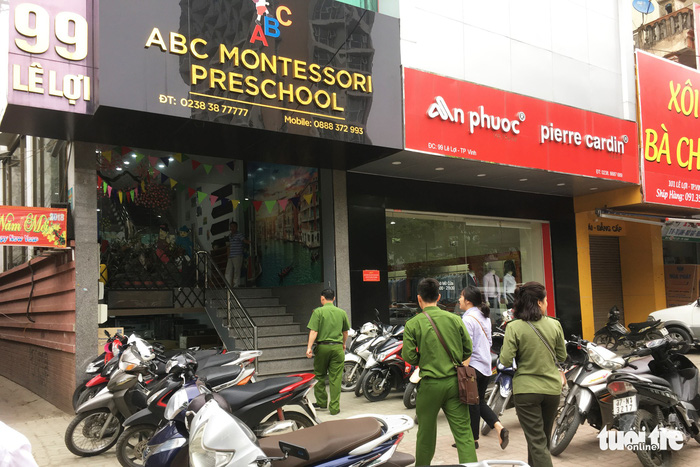 Police officers investigate the scene of incident at ABC Montessori Preschool in Nghe An Province, north-central Vietnam. Photo: Tuoi Tre