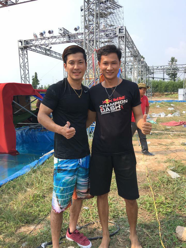 Duc Thanh (R) stands at Champion Dash, an outdoor physical competition in Vietnam, in a photo he provided.