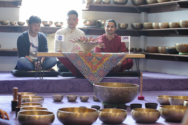 Men sit at a center of Nguyen Manh Duy which offers treatment with Tibetan singing bowls in Ho Chi Minh City, Vietnam. Photo courtesy of Duy