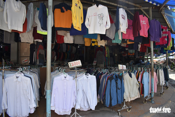 Clothes hang for sale at the Chau Long Market in An Giang Province, southern Vietnam. Photo: Tuoi Tre