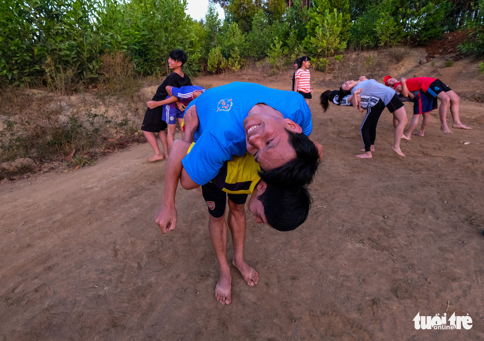 Team members enjoy themselves during a training session. Photo: Tuoi Tre