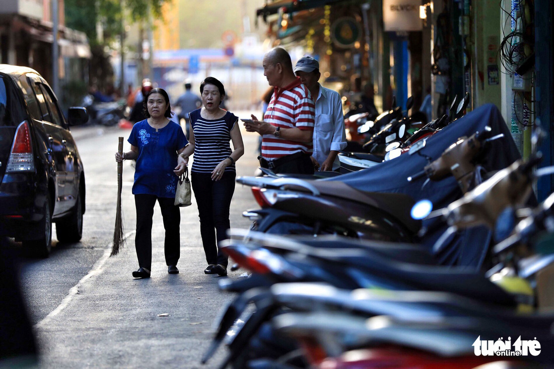 Motorcycles are parked on the pavement on Le Cong Kieu Street in District 1, Ho Chi Minh City, Vietnam. Photo: Tuoi Tre