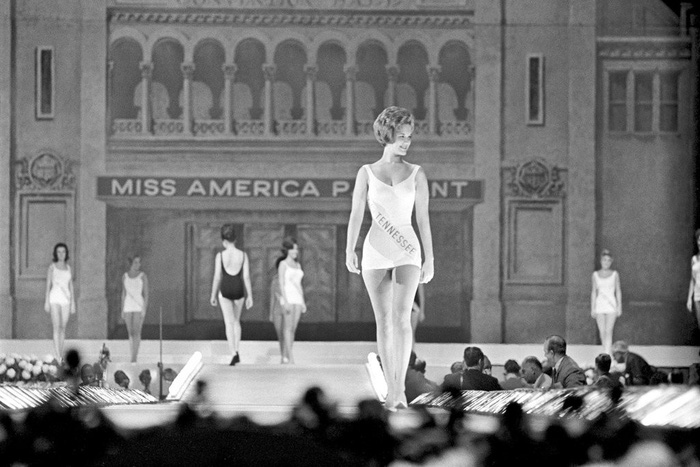 Miss America contestants modeling swimsuits in Atlantic City in 1965.
