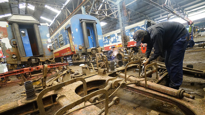 Old train cars are being upgraded at a factory in Ho Chi Minh City. Photo: Tuoi Tre