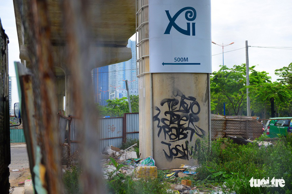 Graffiti are painted on a supporting column of the first metro line in Ho Chi Minh City. Photo: Tuoi Tre
