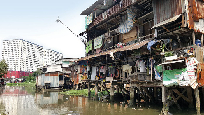 Stilted houses are seen along the Van Thanh Ditch in Binh Thanh District, Ho Chi Minh City, Vietnam. Photo: Tuoi Tre